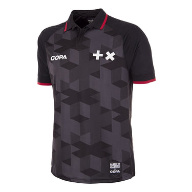 MARTIN GARRIX x COPA Football Shirt Black featuring a geometric pattern, white Garrix logo on the chest, and red accents on the collar.