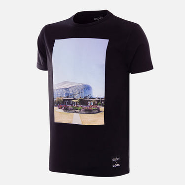 Flat-lay of the Glory x COPA Aviva Stadium T-shirt, featuring a printed image of the Aviva Stadium on a black fabric.