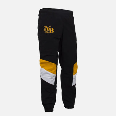 BSC Young Boys black track pants with yellow and white panels front view