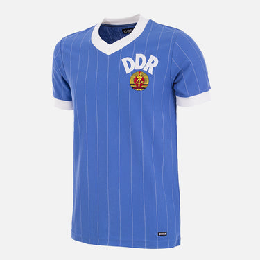 Front view of the DDR 1985 Retro Football Shirt, featuring a blue design with white collar and sleeve accents.