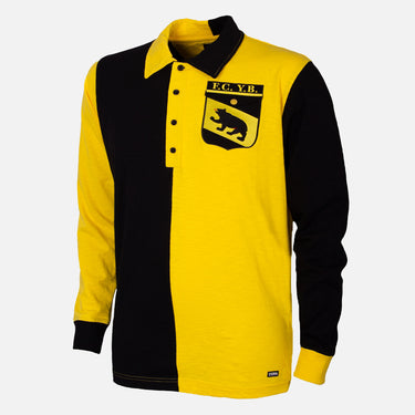Flat-lay of the BSC Young Boys 1900 Retro Football Shirt, featuring a bold yellow and black split design with a vintage button-up collar.