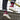model wearing casual red socks with argyle pattern and football pitch markings