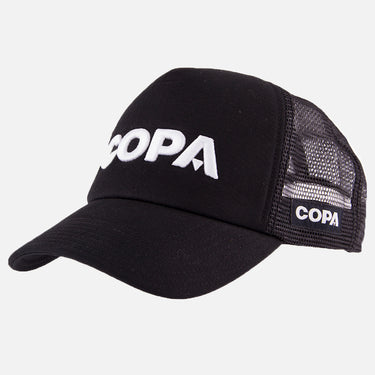 Black COPA trucker cap with white embroidered logo, placed at an angle
