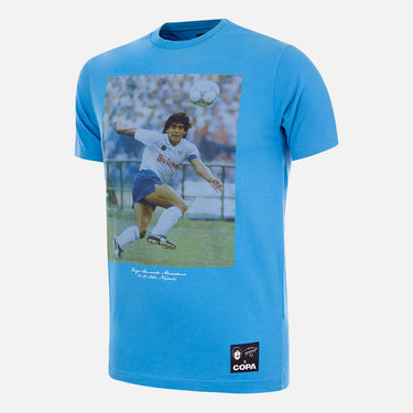 Flat lay of the Maradona x COPA Napoli Away T-Shirt, featuring a sky-blue design with a printed Maradona image.