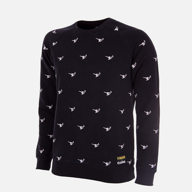 Flat-lay of the Panini All Over Sweater, featuring an all-black design with repeated white Panini logo print and a woven yellow logo patch near the hem.