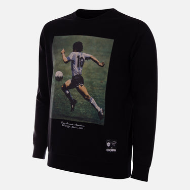 flat-lay of the black sweater featuring iconic Maradona 1986 World Cup moment