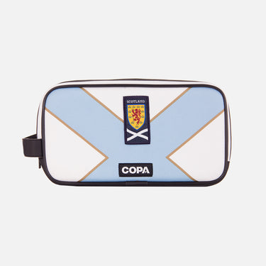 Front view of the recycled toiletry bag featuring a repurposed football shirt with a Scotland badge and COPA logo