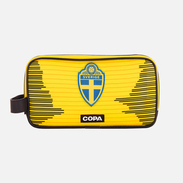 Front view of the recycled toiletry bag featuring a repurposed football shirt with a Sweden badge and COPA logo