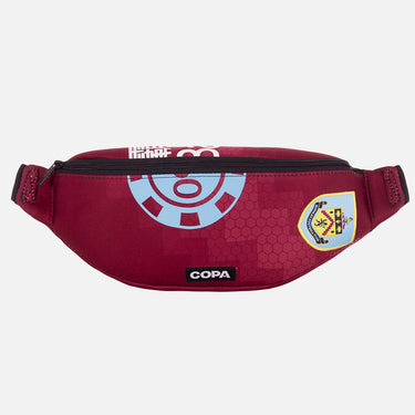 Front view of the recycled fanny pack featuring a repurposed football shirt with a Burnley badge and COPA logo