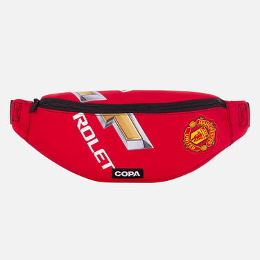 Front view of the recycled fanny pack featuring a repurposed football shirt with a Manchester United badge and COPA logo
