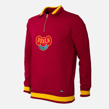 Flat-lay of the Dukla Prague 1968 Retro Football Sweater with maroon body and yellow collar