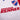Close-up of the Pinturas Renner sponsor logo and C.N. de F. crest on a retro Nacional football shirt.