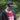 Man wearing a black COPA trucker cap and a red CCCP jersey outdoors