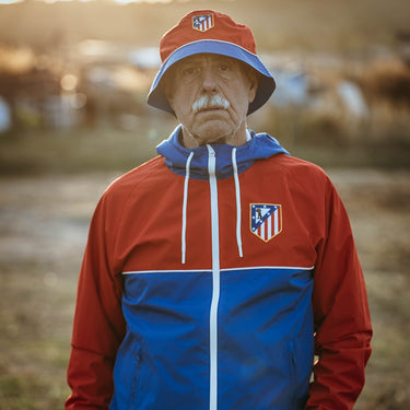 Atlético de Madrid color block bucket hat worn by model lifestyle shot
