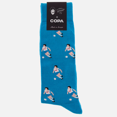 casual blue socks with a repeating pixel-style illustration of maradona