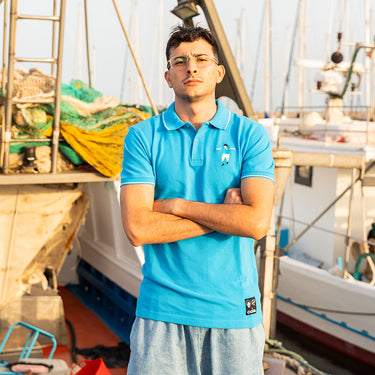 Model wearing sky blue Maradona x COPA Napoli Embroidery Polo Shirt by a marina