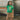 Model wearing the T-shirt in motion, showcasing the retro football-inspired design with the official FIFA mascot from Mexico 1970.