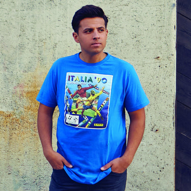 Model wearing the Italy 1990 Panini T-shirt, showcasing its fit and vibrant front design inspired by the iconic tournament.