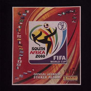 Close-up of the sticker album cover print, showcasing the iconic 2010 World Cup emblem and Panini’s signature sticker album design.