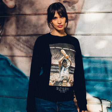 Model wearing the Maradona x COPA Celebration Sweater featuring World Cup 1986 imagery