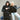 Two models wearing the FC Internazionale Taper Hooded Sweater, showcasing the Biscione ribbon detail on the sleeves.