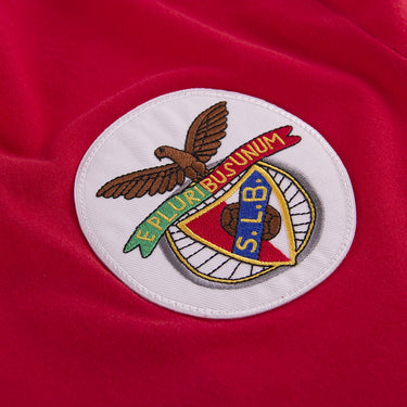 Close-up of the Benfica crest, embroidered in detail on the chest, showcasing the club's historic emblem with the eagle and football.