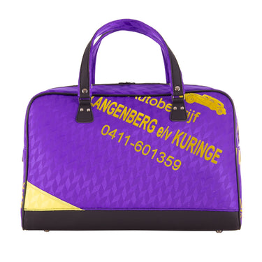 Front angled view of the bag showing both handles and the vintage football print.